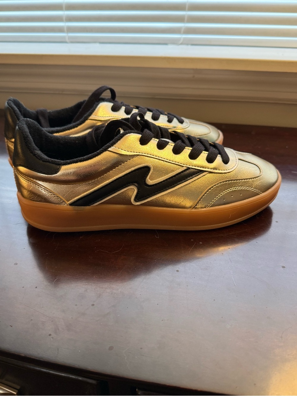Madden Girl Women’s Metallic Gold Low-Top Sneakers with Gum Sole